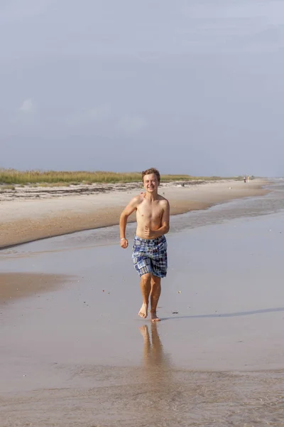 Cute Boy Jogging Beach Apalachicola — Stock Photo, Image