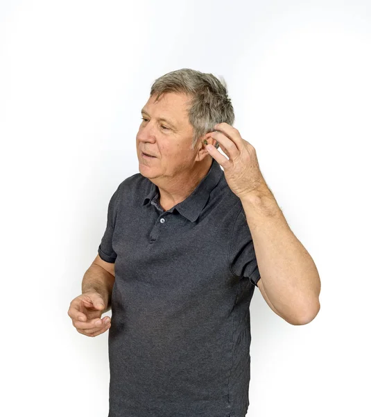 Muž Naslouchadlem Levém Uchu — Stock fotografie