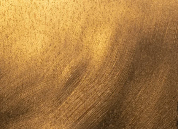 Riflesso del sole in metallo dà un dorato prezioso backg cercando — Foto Stock