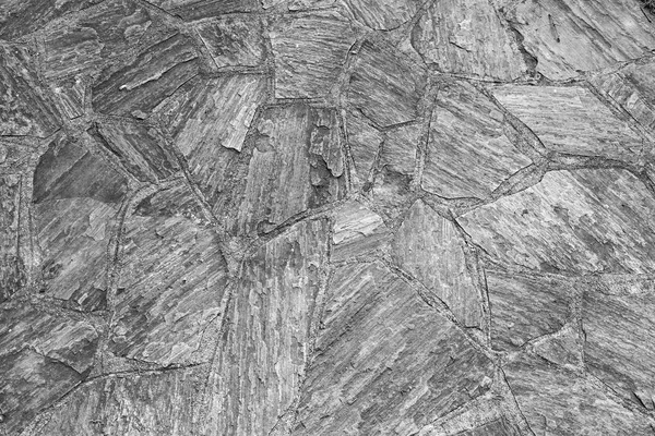 Muster alter unregelmäßiger Steine ergibt einen harmonischen Hintergrund — Stockfoto