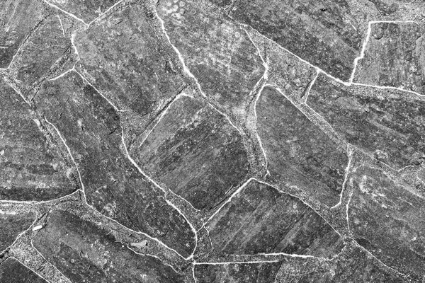 Muster alter unregelmäßiger Steine ergibt einen harmonischen Hintergrund — Stockfoto