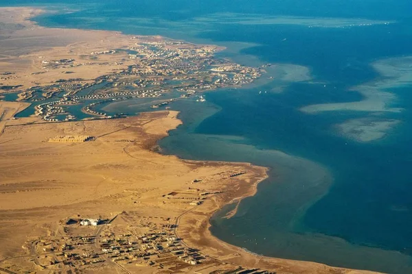 aerial of desert and red sea when approaching airport Hurghada