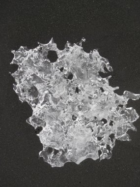 Jokulsa 'da ünlü Diamond Beach buzdağı ışıltı parçaları