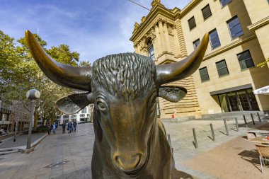 Bull sculpture in front of Frankfurt Stock Exchange building. Th clipart