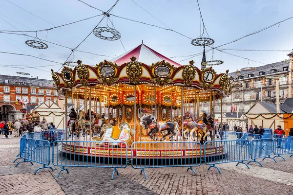 Carousell for children in the evening at the plaza de Mayor in M — Stock Photo, Image