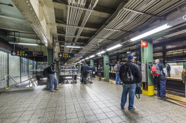 People wait at subway Barclays center in New York clipart