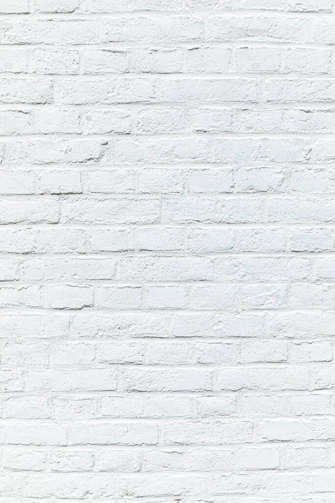 old white brick wall painted in white as harmonic background