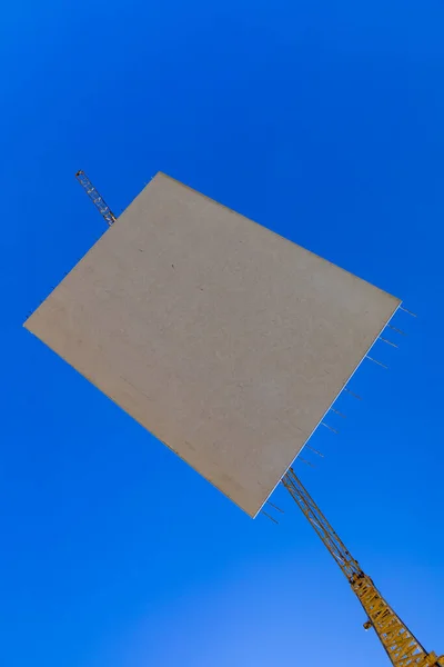 waterproof concrete wall on a hook of a crane at the construction site in Germany