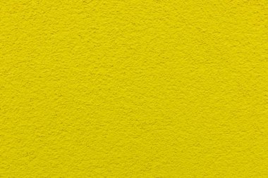 harmonik sarı eski alçı duvarın arkaplanı