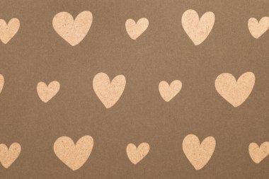Şirin kalpler seamless modeli, kahverengi bir arka plan üzerinde Hearts