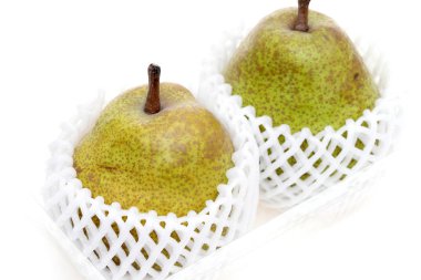 Green ripe pear on white background, Autumn fruit, in studio shot clipart
