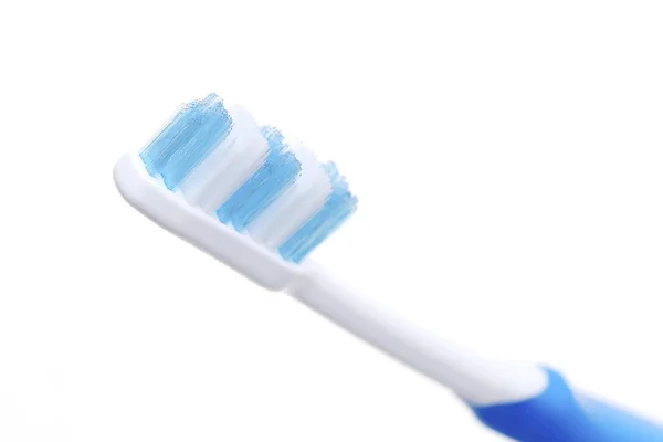 白い背景に隔離された青い歯ブラシ — ストック写真