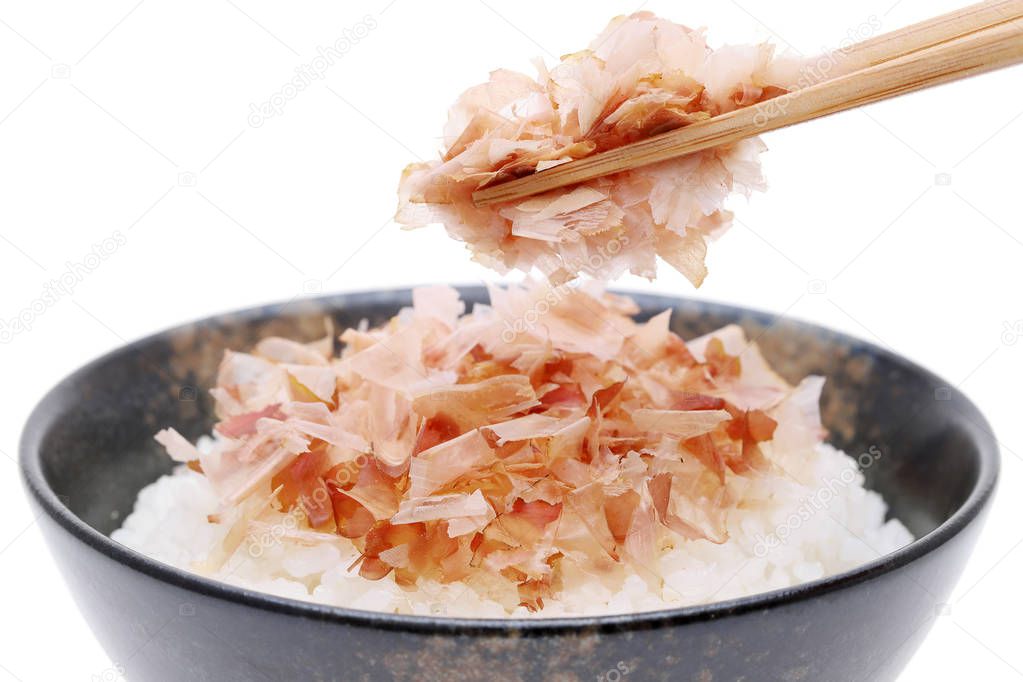 Japanese food, Katuobushi on cooked white rice on white background  