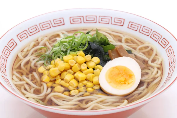 Japanese Soy sauce ramen noodles in a bowl on white background