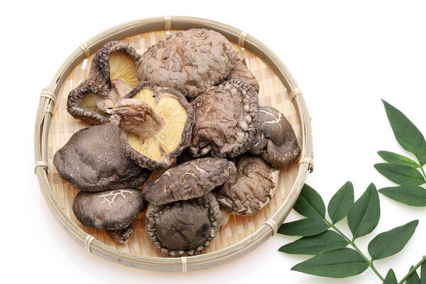 Japanese dried shiitake mushrooms in a bamboo basket 