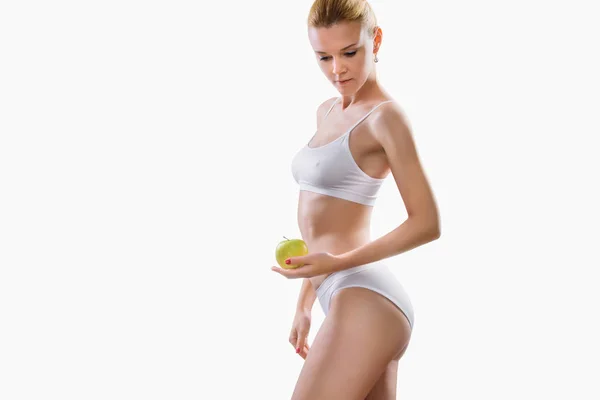 Gesunder Körper - attraktive Frau mit Apfel — Stockfoto
