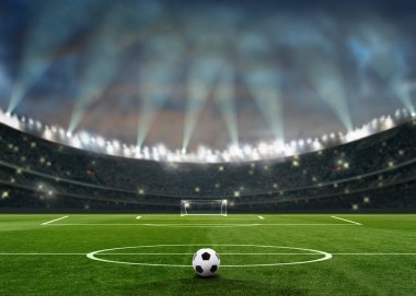 A soccer ball in the stadium before the game clipart