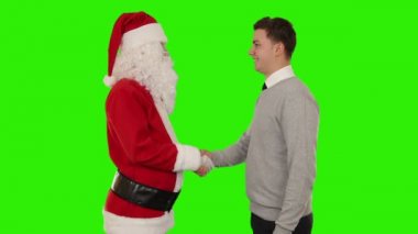 Noel Baba ve Genç İşadamı el sıkışıyor, Yeşil Ekran