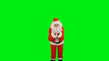 Noel Baba ellerinden sihirli toz üflüyor, ön görüş, Yeşil Ekran Chromakey