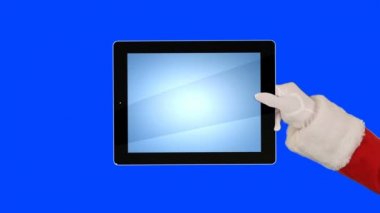 Noel Baba bir tablet sunar sonra bir öpücük gönderir ve güle güle der, Mavi Ekran Kromakusu
