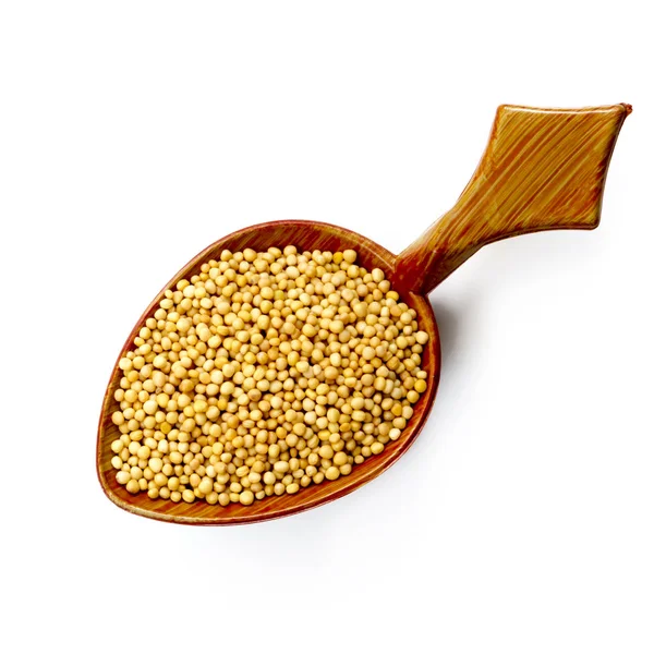 Yellow Mustard Seeds on Wooden Spoon Isolated on White Top View — Stock Photo, Image