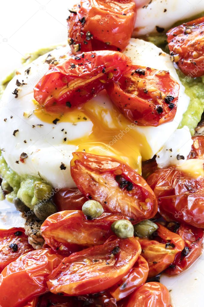 Poached Egg on Toast with Avocado Roasted Cherry Tomatoes and Ca