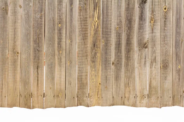 木製のフェンスの背景に白いふわふわ雪 — ストック写真
