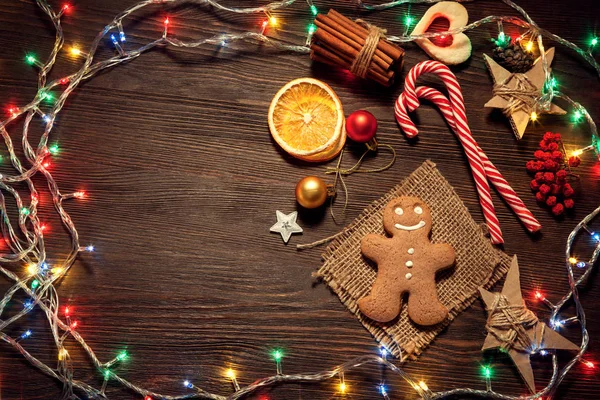 Gingerbread Christmas Tree Decorations Light Garland Wooden Table Top View — Stock Photo, Image