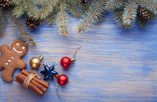 Top View Gingerbread Christmas Balls Cinnamon Sticks Blue Wooden Table — Stock Photo, Image