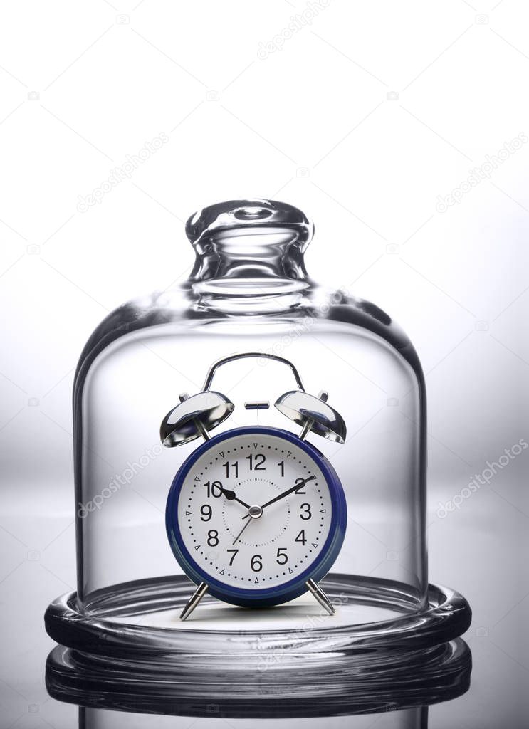 Classic blue alarm clock morning time. Save Time and Time Management concept.