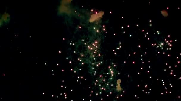 Fireworks in night sky. Explosion of many bright lights. Taken on 9-may celebration. Fire and pyrotechnics event party. — Stock Video