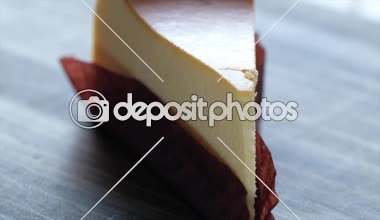 Ahşap arka plan üzerinde tatlı Cheese cake