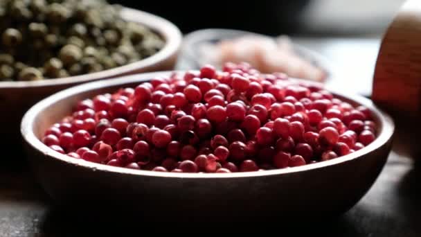 Red Green Peppercorns Wooden Bowls — Stock Video