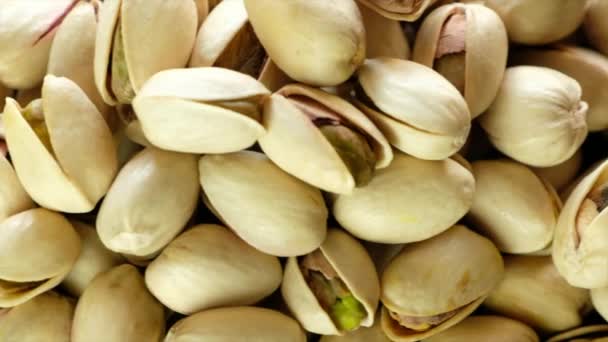 Tasty Pistachios Nuts Isolated Wooden Background — Stock Video