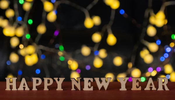 Frohes Neues Jahr Hölzerne Buchstaben Mit Lichtern Bokeh Hintergrund Selektiver — Stockfoto