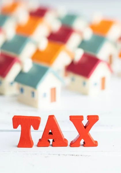 Red Wooden Word Tax Real Estate — Stock Photo, Image