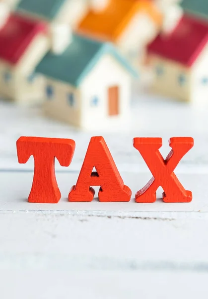 Red Wooden Word Tax Real Estate — Stock Photo, Image