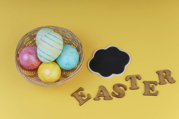 easter template with colorful eggs and chalkboard on yellow background