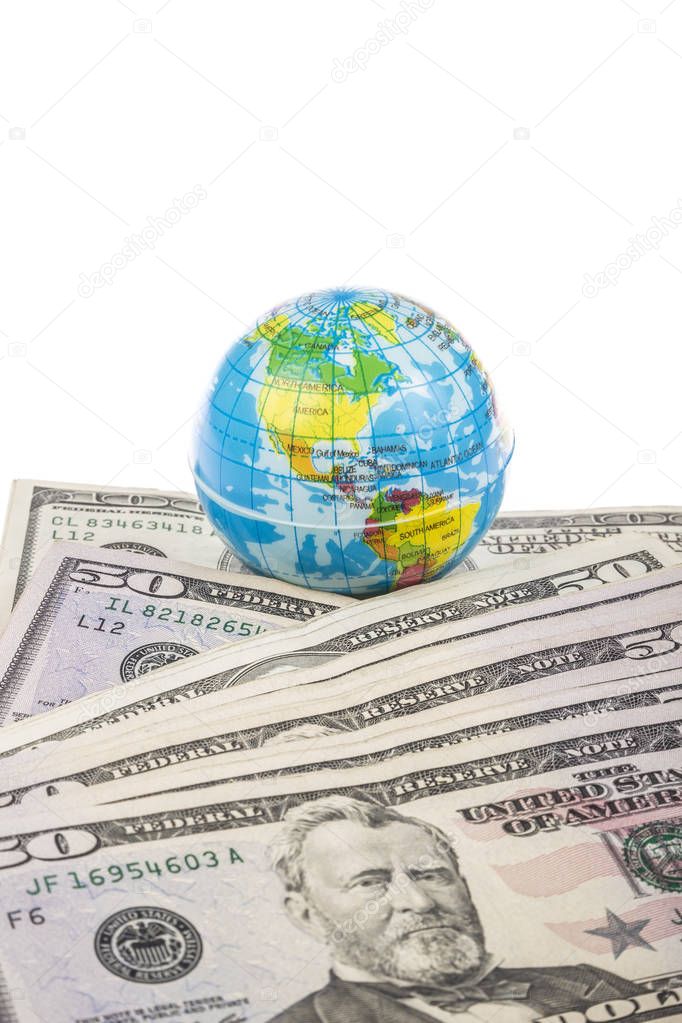 American Dollars and globe isolated on white 