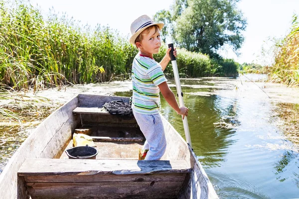 Young Boy Rowing Oar Standing Boat River — Stock Photo, Image