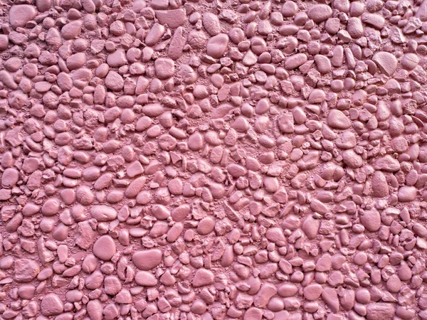 Rock wall decoration painted pattern, pebble stone texture, cobble stones masonry, rough surface of the wall