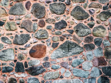 Taş duvar arka plan veya doku olarak. Arka plan veya doku olarak taş duvar parçası