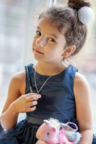 Portrait of little brown-eyed Muslim girl — Stock Photo, Image