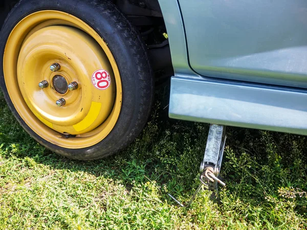 Spare wheel installed on the car