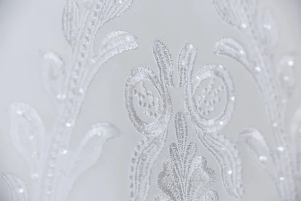 Macro vit spets broderi bröllopsklänning textil — Stockfoto