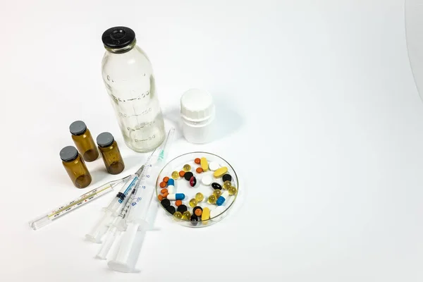 Colorful medical pills and bottles, medicine and healthcare concept