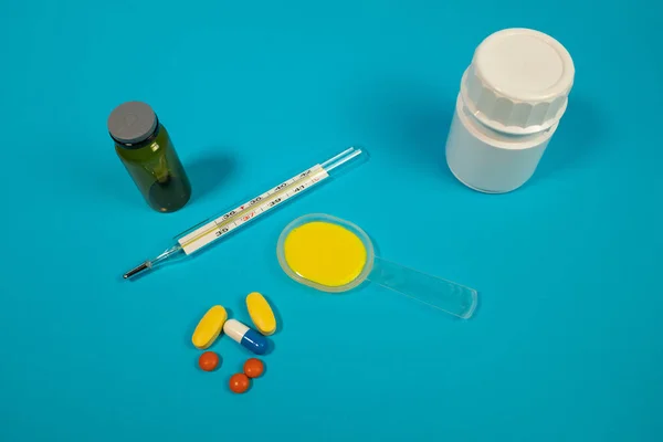 Colorful medical pills and bottles, medicine and healthcare concept