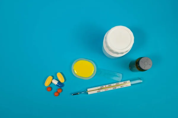Colorful medical pills and bottles, medicine and healthcare concept
