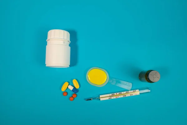 Colorful medical pills and bottles, medicine and healthcare concept