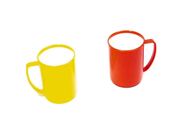 白地に明るい色のカップ — ストック写真